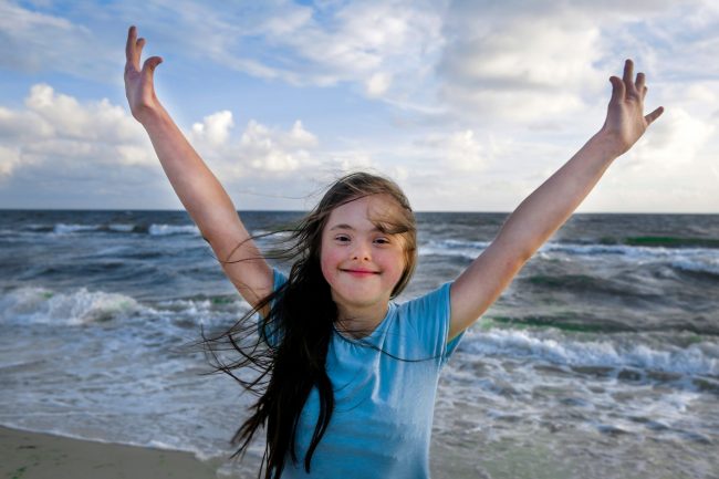 Disabled Girl on beach image
